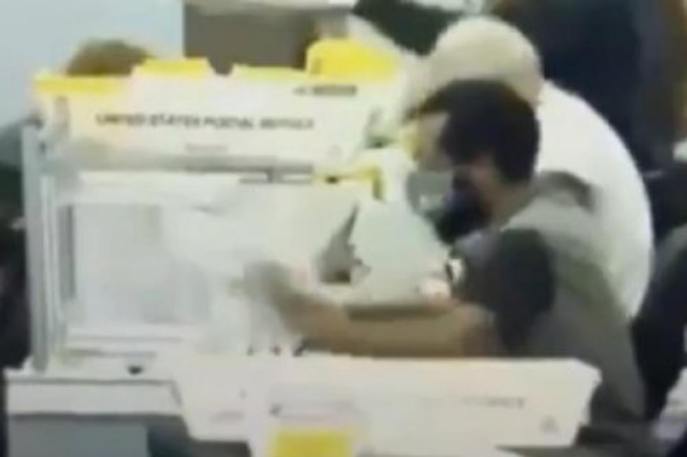 (Видео) Синот на Трамп објави видео како бројач на гласови во САД, го фрли ливчето во ѓубре