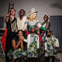 (Видео) Мадона за празниците ги однесе посвоените деца во нивниот роден град
