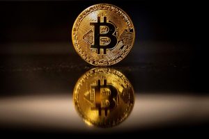 Биткоинот сруши нов рекод, една дигитална валута вреди 63 долари