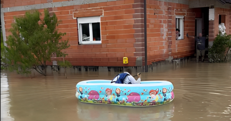 (Фото) Маж плови во детски базен и му носи кафе на комшијата по поплавите во Словенија и Хрватска