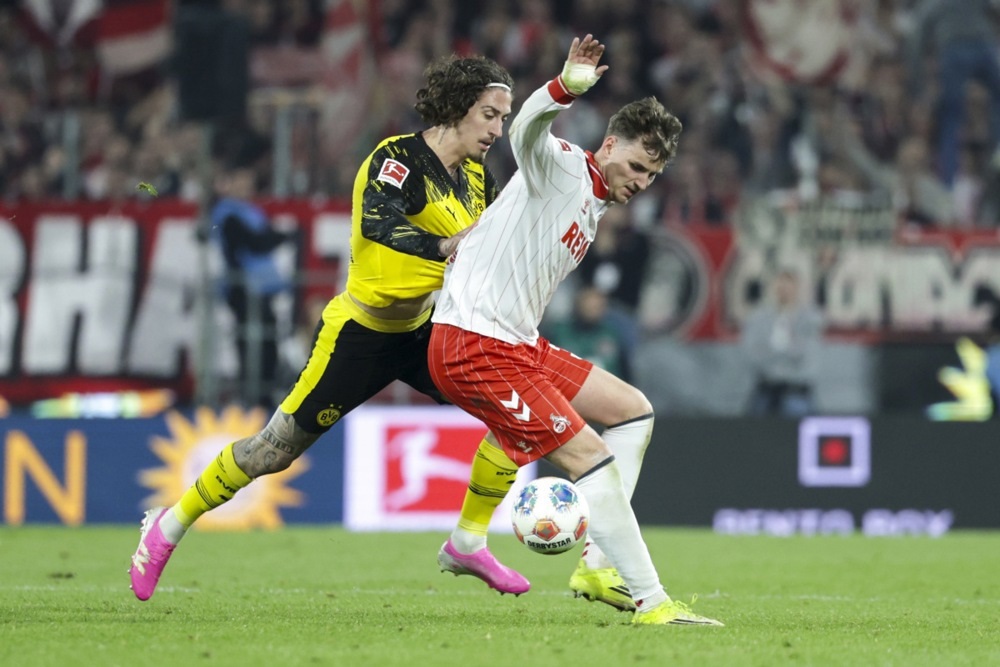 (Видео) Борусија со играч повеќе победи во Келн